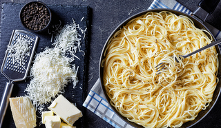 Cacio E Pepe, Traditional Italian Dish Of Pasta Spaghetti Mixed
